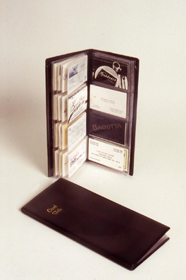 CAN I HAVE YOUR CARD?<br />
1991 Ongoing<br />
2 Business Card File Organizers in a Collection of Multiple Business Card File Organizers with 1 Organizer Showing a Selection of Business Cards Vertically Displayed and Open and the Other Flatly Displayed and Closed<br />
4 1/2” x 10”<br />