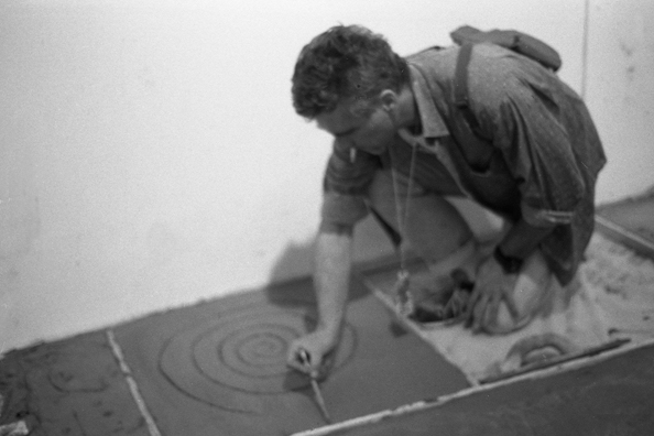 NORMA TALMADGE'S CHINESE THEATER: THE OFF BROADWAY REVIEW; NY<br />
1992 Ongoing<br />
Happening: Viewers Immortalizing Themselves by Making Imprints in Fresh Cement in Homage to the Forgotten Silent Diva, Norma Talmadge, the Accidental Auteur of the Canonical Practice<br />
Photograph of Happening Displayed on Wall in Collector's Edition Photograph Book: Mike Ballou, “Isle of Conquest” (1919)<br />
4” x 6”<br />